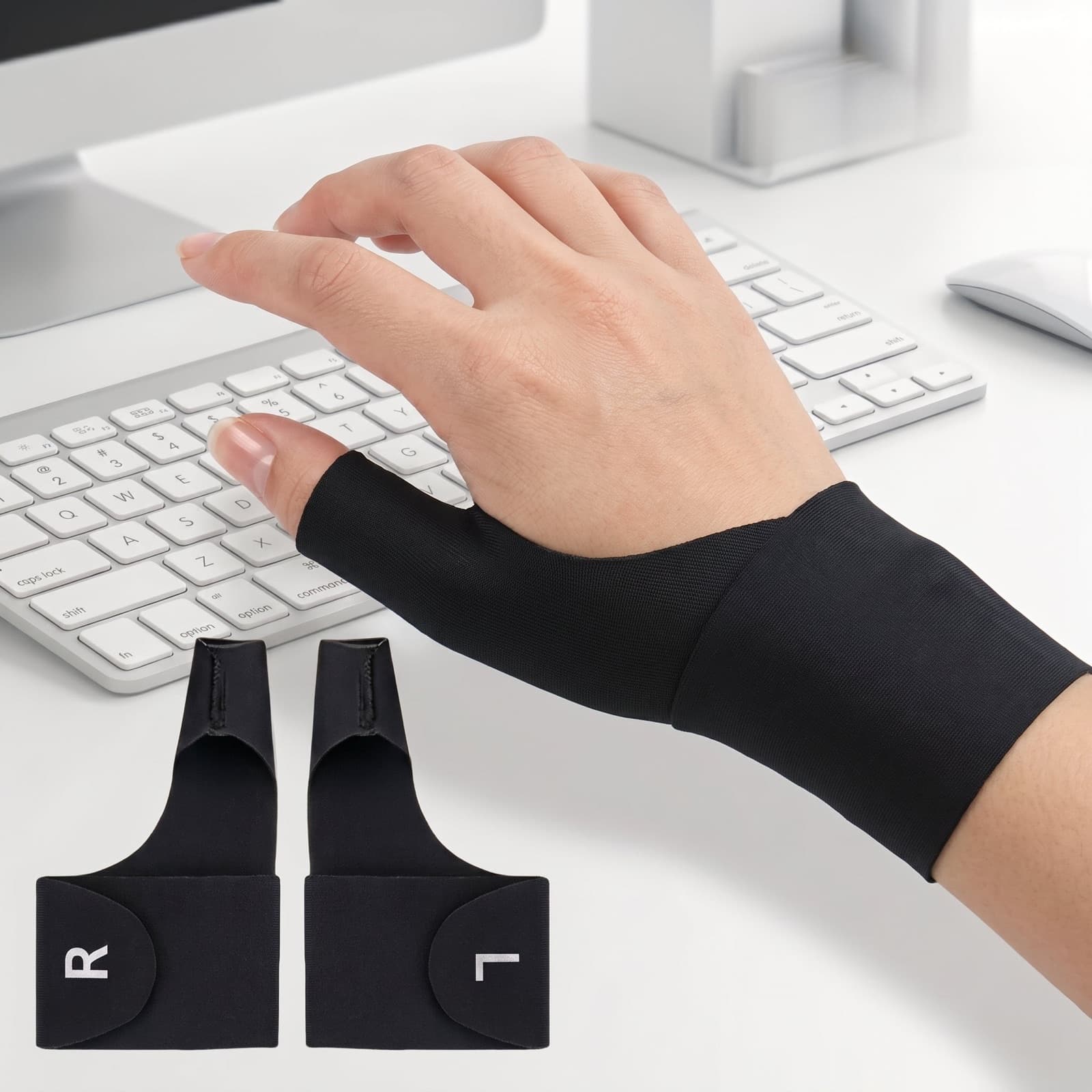 Vitella Wrist & Thumb Compression Sleeve worn while typing at a keyboard